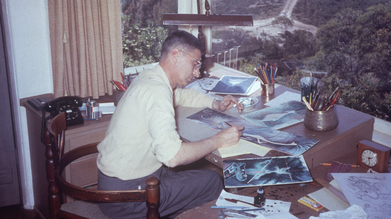 Dr. Seuss working at a desk