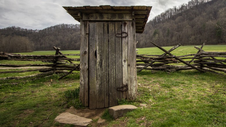 outhouse in field