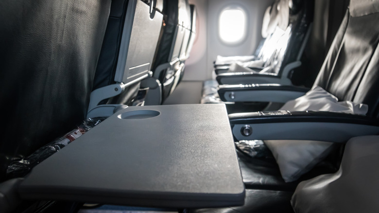 empty tray tables on airline