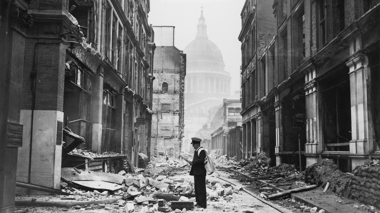 postman delivering letters during air raid