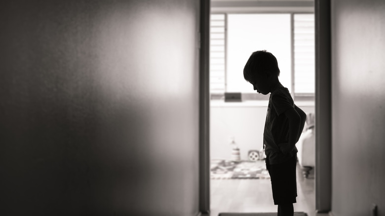 silhouette of little boy