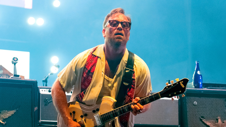 dan auerbach playing with the black keys onstage