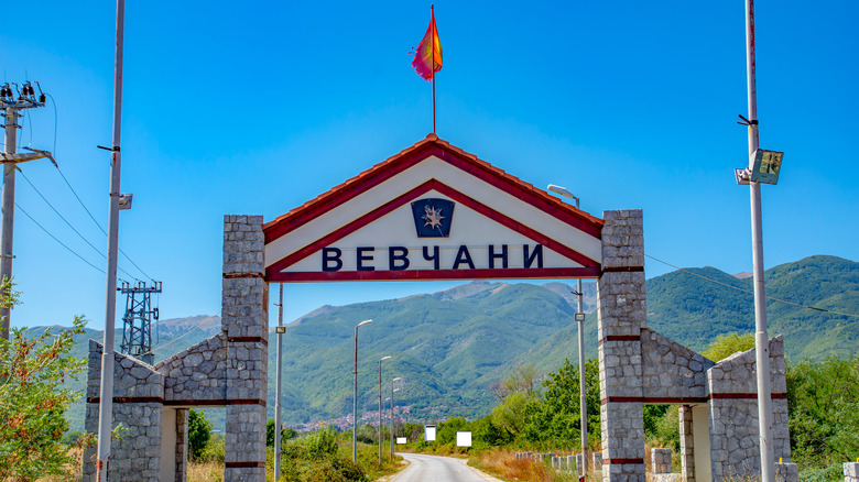 Vevcani entrance arch with flag