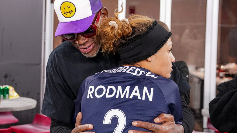 Dennis Rodman hugging Trinity 