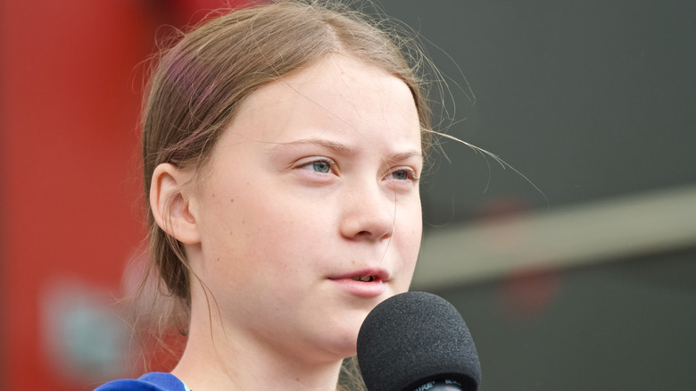 Greta Thunberg with microphone