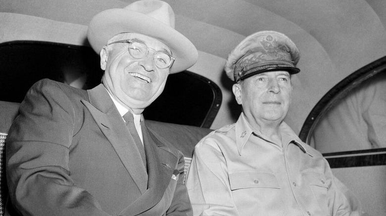 Truman and MacArthur in a car