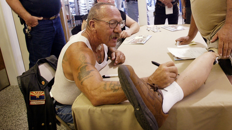 Sonny Barger signing autographs 