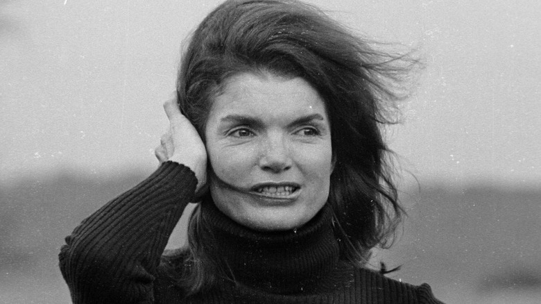 Jackie Kennedy is caught in the wind
