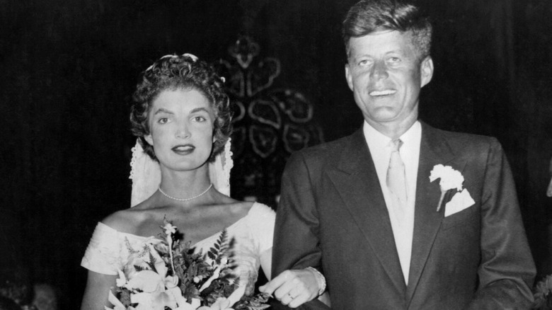 John and Jackie Kennedy walk down the aisle