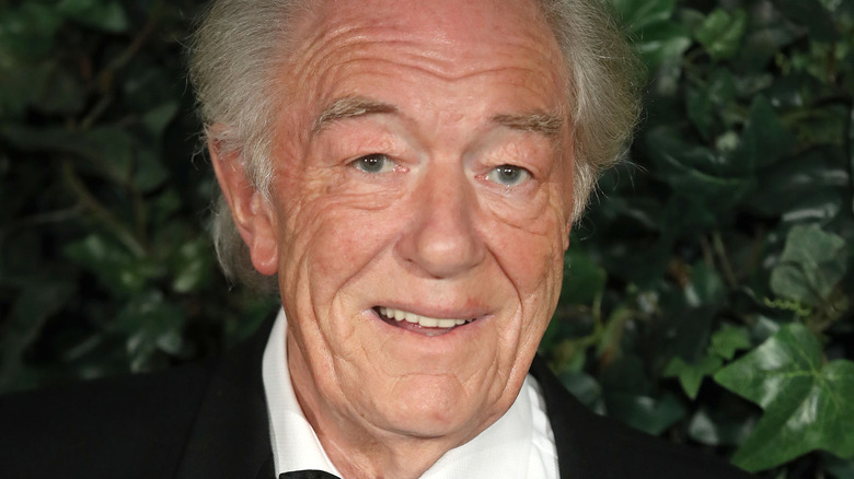 Michael Gambon in tuxedo smiling