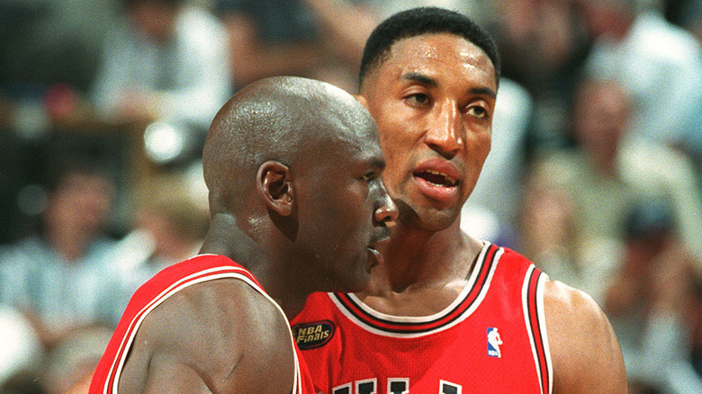 Michael Jordan hugs Scottie Pippen