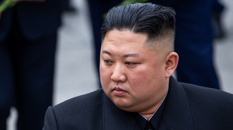 Kim Jong-un glancing sideways 