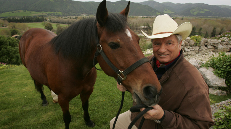 Monty Roberts and a horse