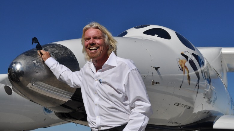 Richard Branson with a plane