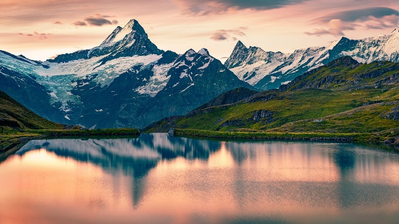 snow-covered Alps with lake