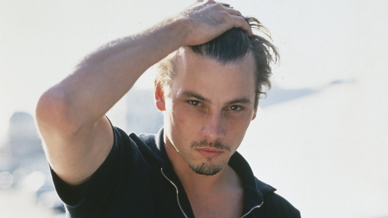 Skeet Ulrich holds his head