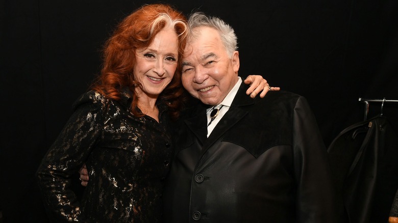 Bonnie Raitt and John Prine smiling