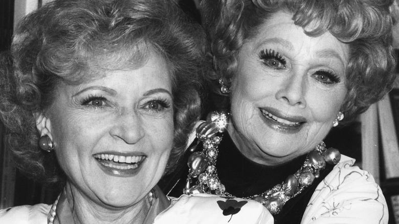 Betty White and Lucile Ball smiling 