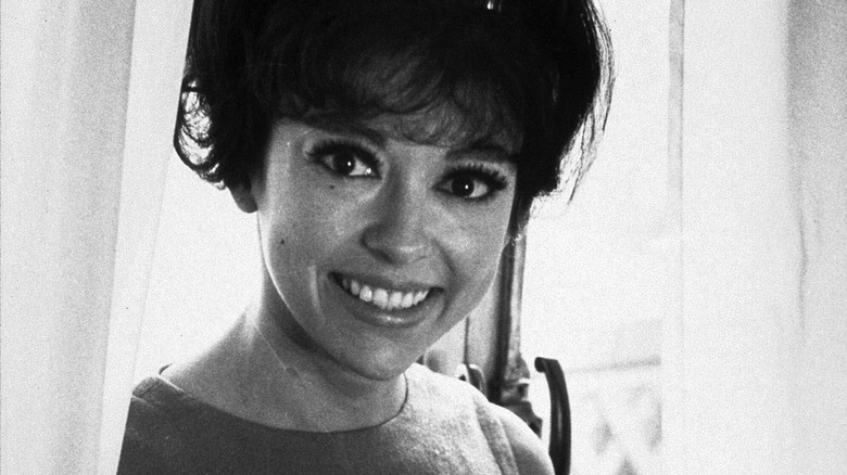 Rita Moreno smiling in 1965