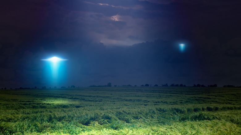 Lights in sky over field