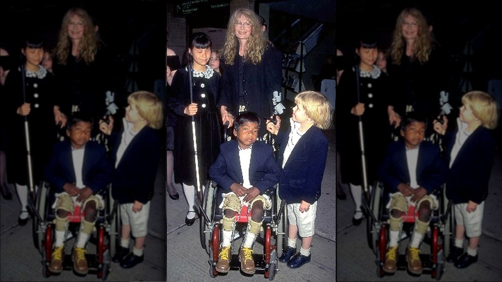 Mia Farrow with 3 children 