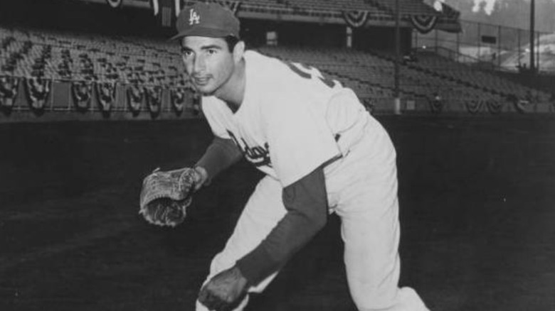 Sandy Koufax posing for a photo