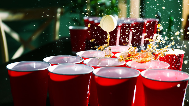 ball splashes beer pong cup