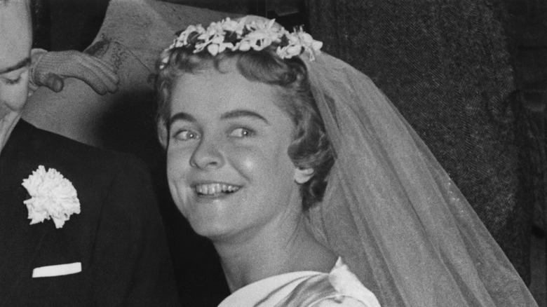 Suzanne Holman smiling on her wedding day 