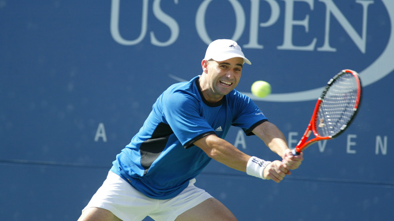 Andre Agassi playing tennis