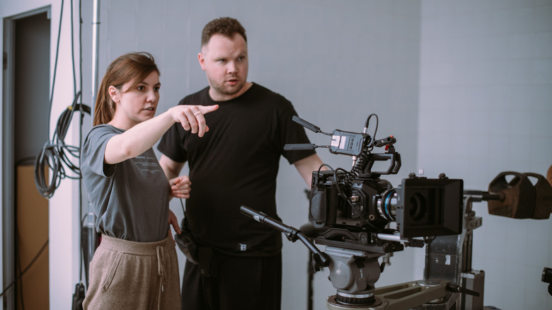 filmmakers discussing a shot