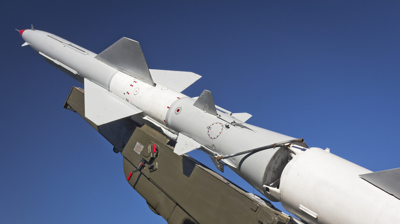 White missile pointing to blue sky