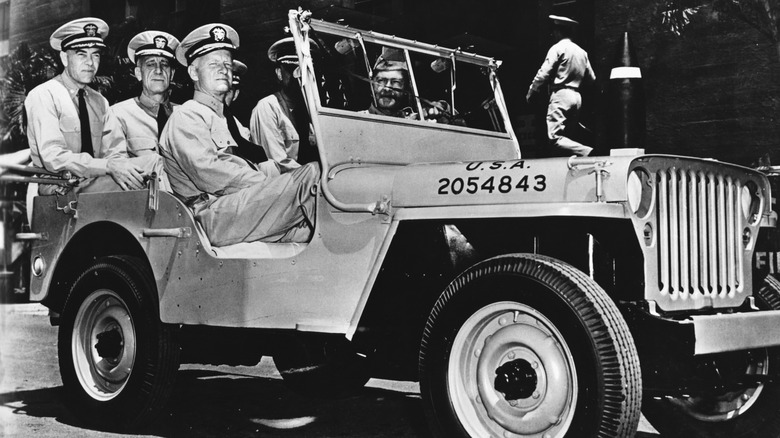 army officials in jeep