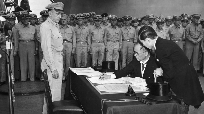 Japanese officials sign surrender