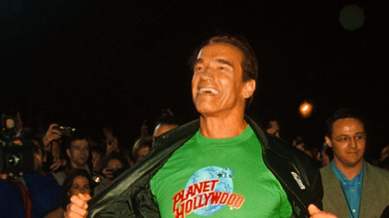 Arnold Schwarzenegger in planet hollywood shirt