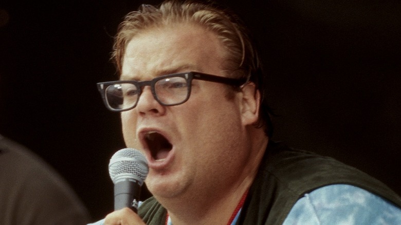 Chris Farley performing on stage