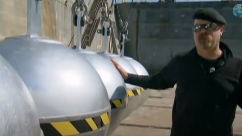 jamie hyneman with the wreckingball newton's cradle