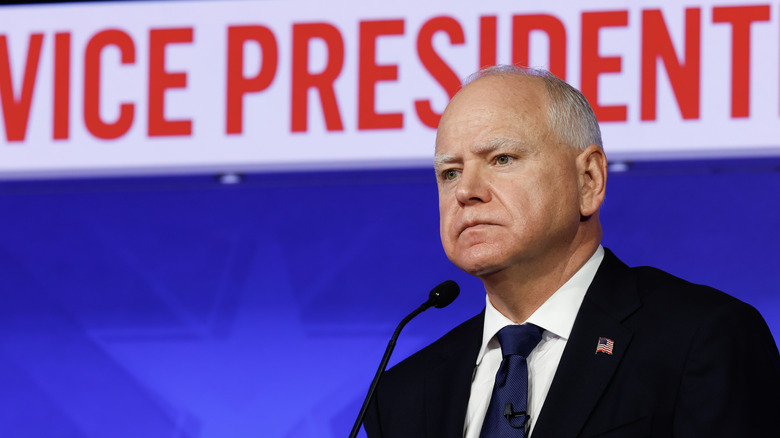 Tim Walz unsmiling VP debate podium