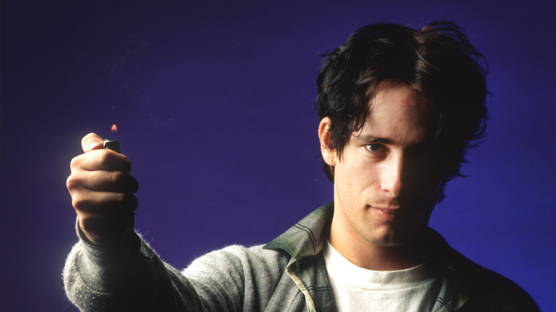 Jeff Buckley holding lighter