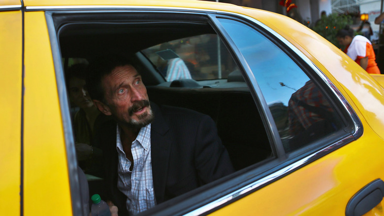 John McAfee in a cab