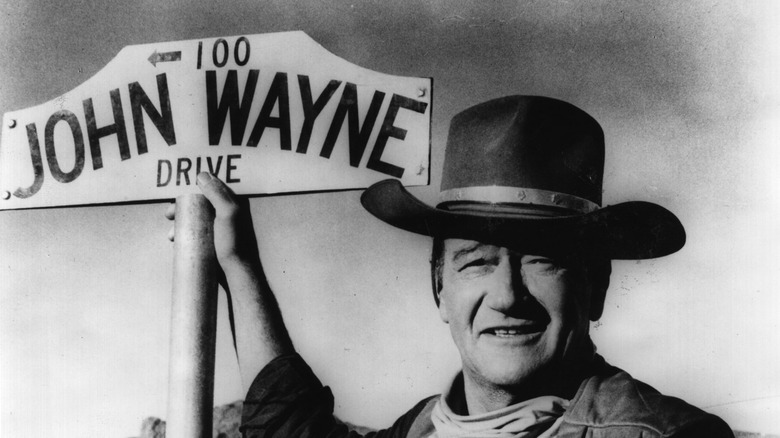 john wayne in front of a street named for him