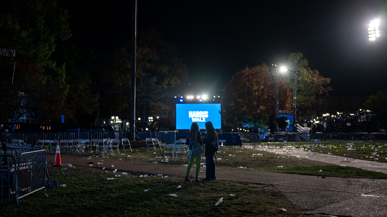 Harris supporters starting at election screen