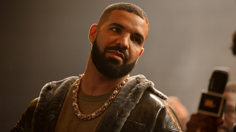 Drake frowning during Drake's Till Death Do Us Part rap battle