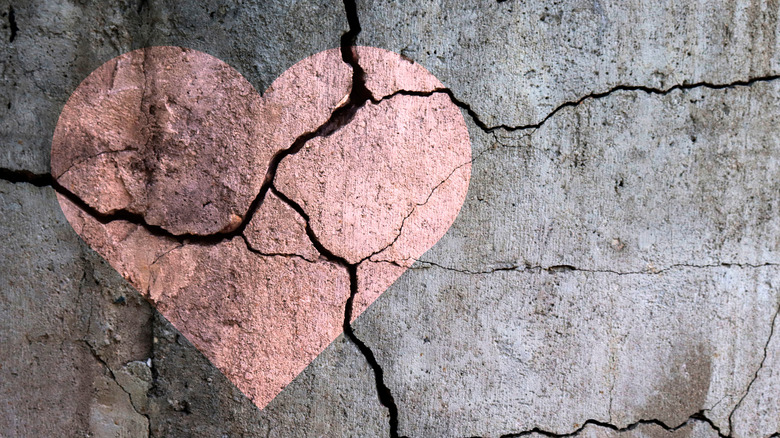 heart on cement wall