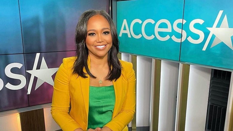 Faith Jenkins smiling on set of Access Hollywood