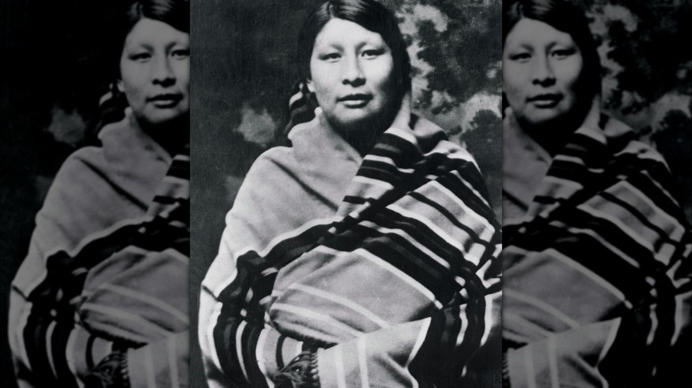 black and white photo of Rita Smith wrapped in blanket