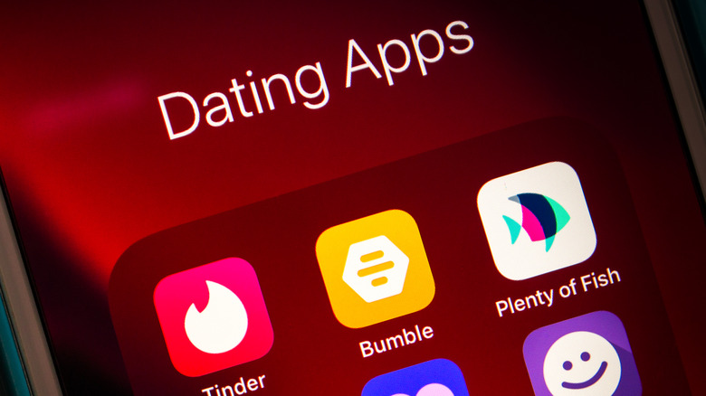 smartphone with dating app icons