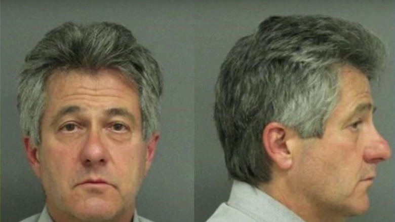 Paul Curry looking sad in a front and profile mugshot