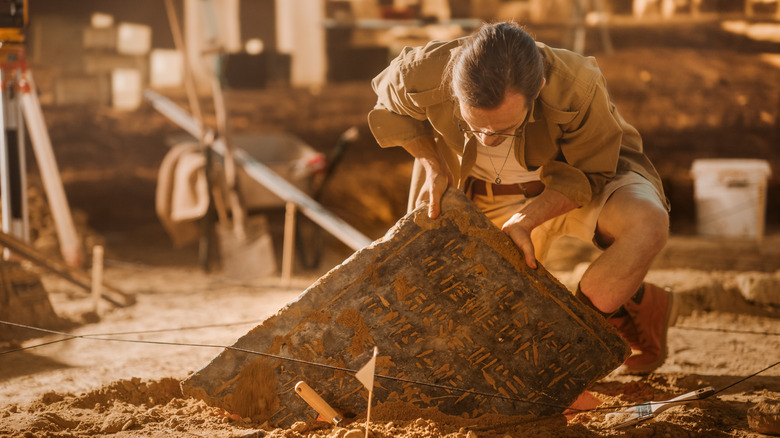 Archaeologist at dig site