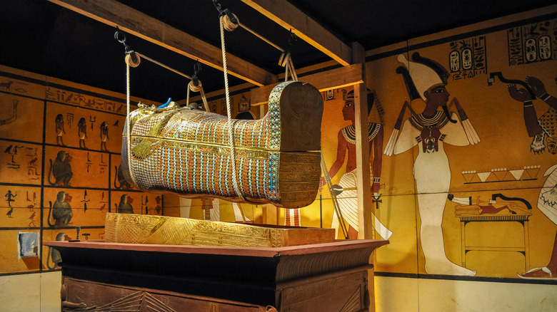 small gilded Egyptian coffin