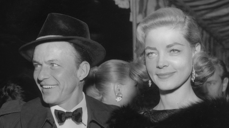 Sinatra and Bacall walk together